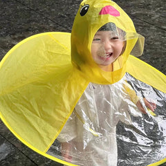 hildren's UFO-style raincoat with a cute yellow duck design—featuring a cape-like fit and an umbrella-style hood; a viral hit on Douyin suitable for boys and girls.