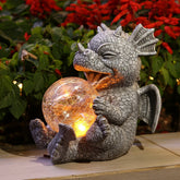 Dinosaur Solar Light β Playful Sculpture by Day, Warm Guardian by Night | A Garden Fairytale